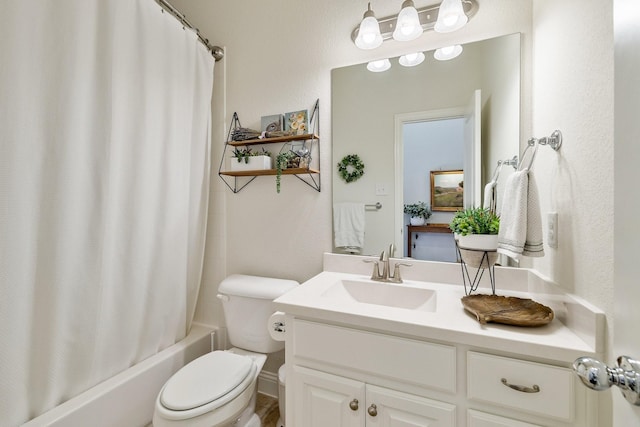 full bathroom with vanity, toilet, and shower / bath combo with shower curtain