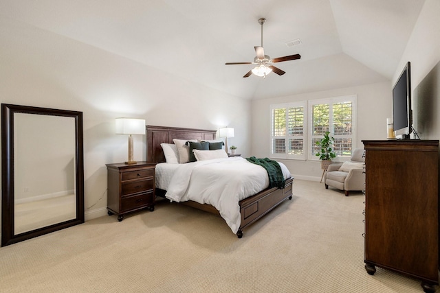 carpeted bedroom featuring lofted ceiling and ceiling fan