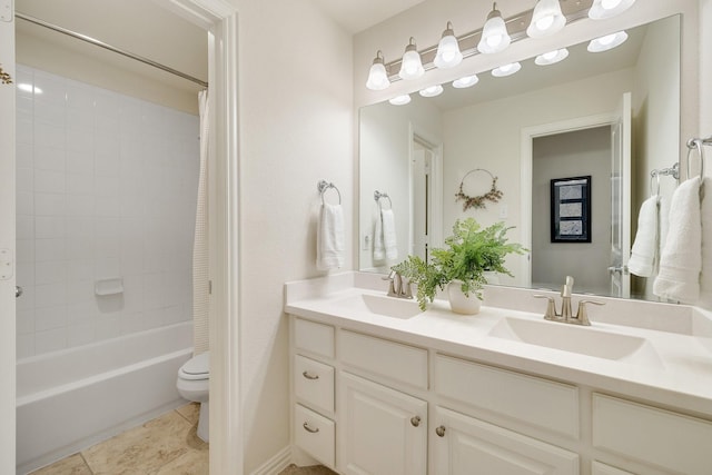 full bathroom featuring shower / bath combination with curtain, vanity, toilet, and tile patterned flooring