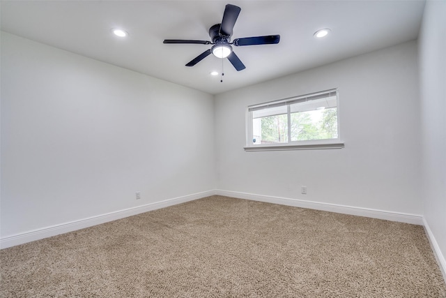 unfurnished room featuring carpet flooring and ceiling fan