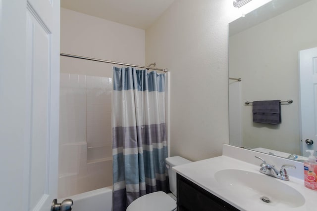 full bathroom featuring vanity, toilet, and shower / bath combo with shower curtain