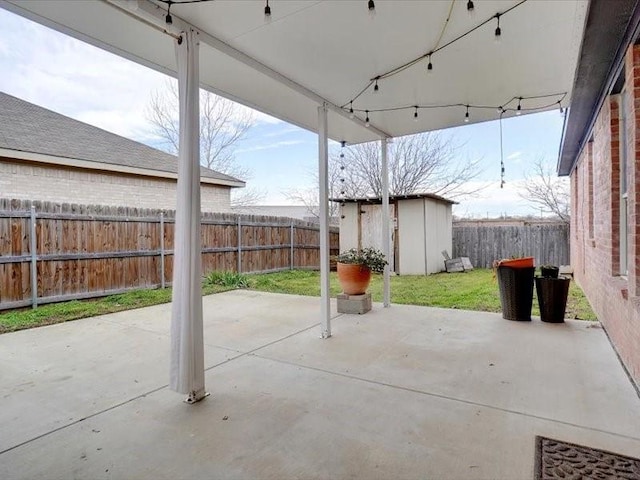 view of patio / terrace featuring a shed