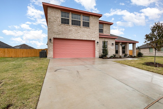 view of front of house featuring cooling unit, a front lawn, and a garage