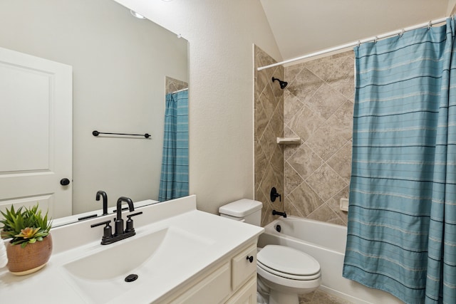 full bathroom featuring vanity, shower / tub combo, vaulted ceiling, and toilet