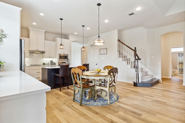 dining room with light hardwood / wood-style floors