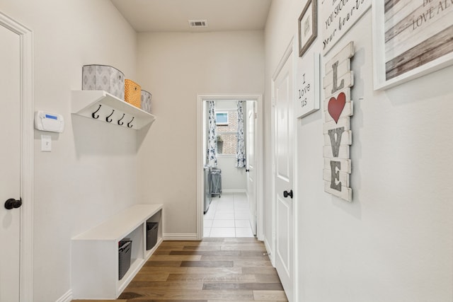 mudroom featuring light hardwood / wood-style flooring