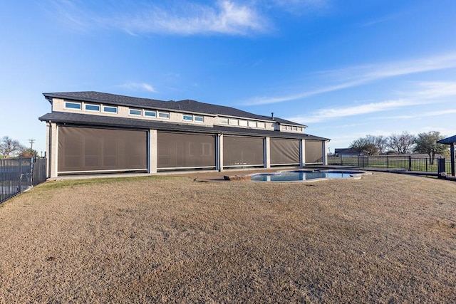 exterior space featuring a fenced in pool and fence