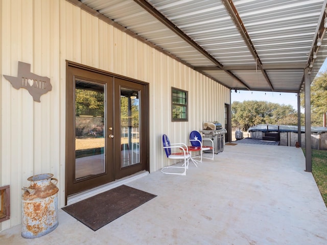 doorway to property with french doors and a patio area