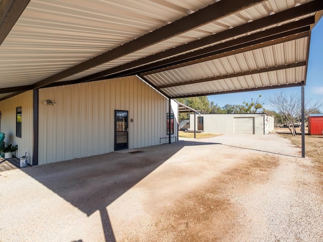 garage with a carport