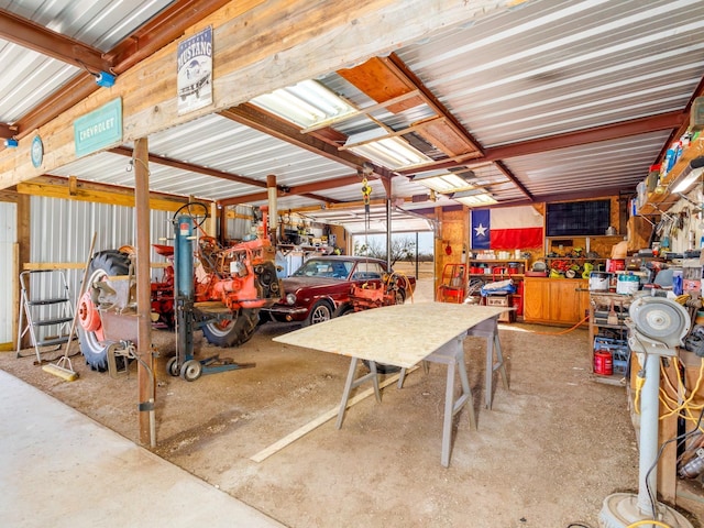 garage with a workshop area