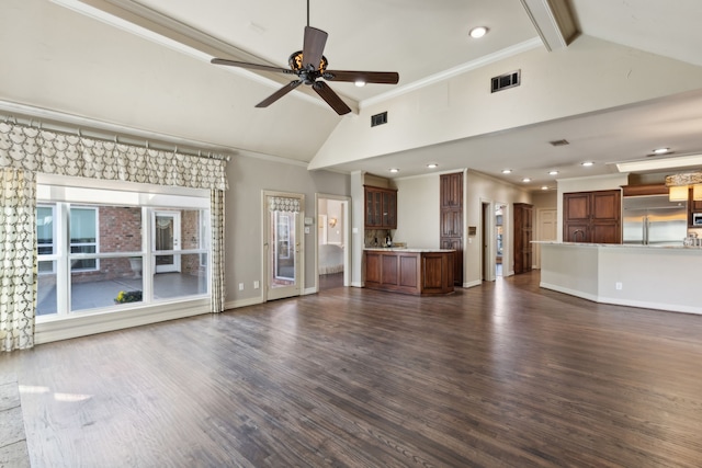 unfurnished living room featuring dark wood-type flooring, ceiling fan, ornamental molding, and vaulted ceiling with beams