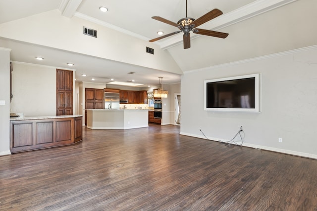 unfurnished living room with ceiling fan, lofted ceiling with beams, dark hardwood / wood-style floors, and ornamental molding