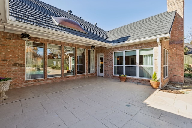 back of house featuring a patio area