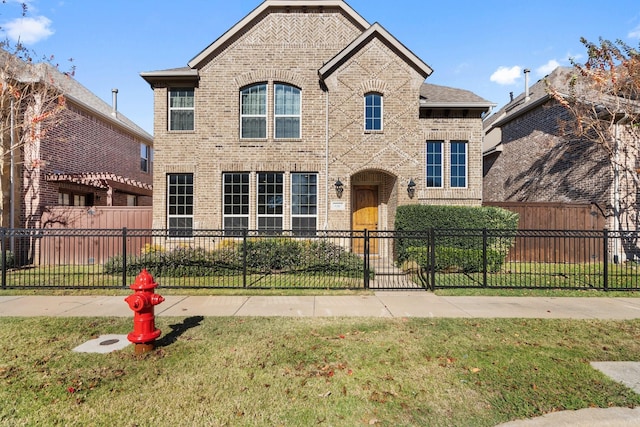 view of front of house featuring a front lawn