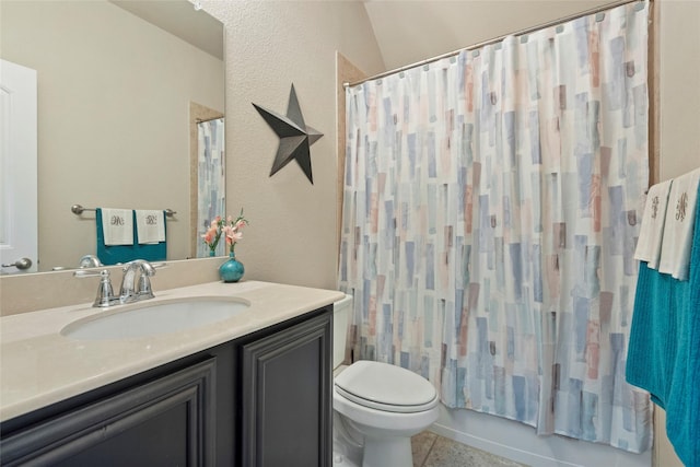 full bathroom featuring vanity, tile patterned floors, toilet, and shower / bath combo