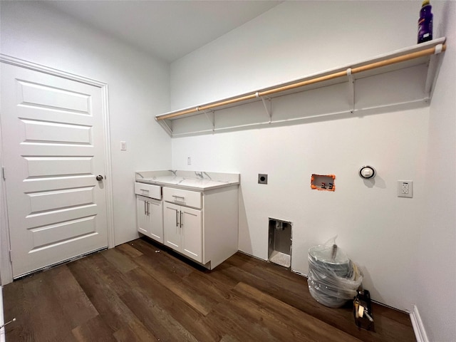 laundry area with hookup for an electric dryer, hookup for a washing machine, and dark hardwood / wood-style floors