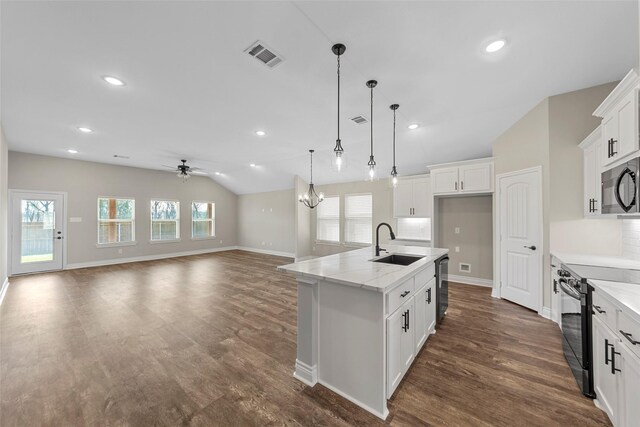 kitchen with ceiling fan with notable chandelier, sink, white cabinetry, and black appliances