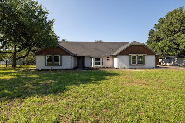 view of front of home with a front lawn