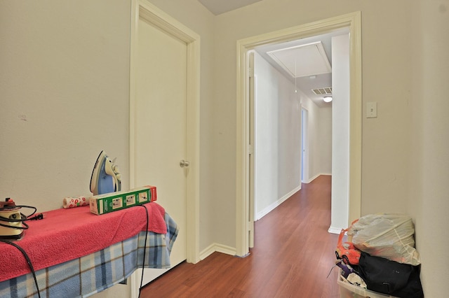 hallway featuring wood-type flooring