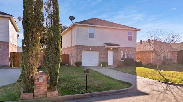 front of property with a garage and a front lawn