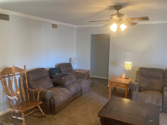 carpeted living room with ceiling fan and crown molding