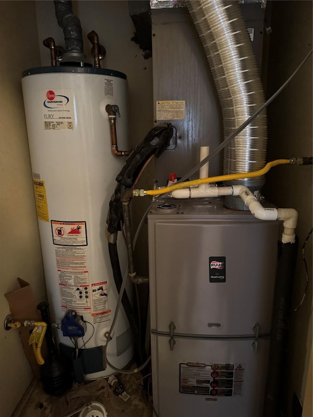 utility room featuring gas water heater