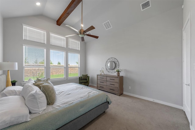 bedroom with ceiling fan, beam ceiling, light colored carpet, and high vaulted ceiling