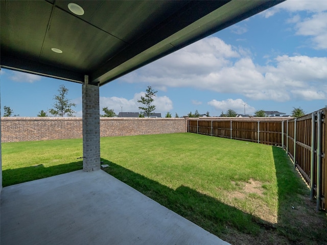 view of yard with a patio area