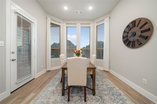 dining room featuring light hardwood / wood-style floors