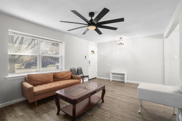 living room with hardwood / wood-style flooring and ceiling fan