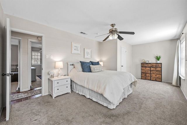 carpeted bedroom featuring ceiling fan