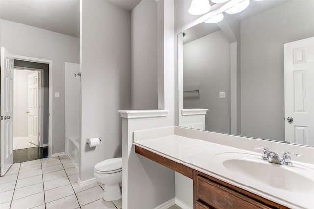 full bathroom with tile patterned floors, toilet, shower / bathing tub combination, and vanity