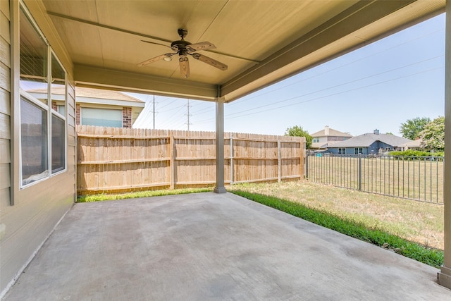 view of patio / terrace featuring ceiling fan