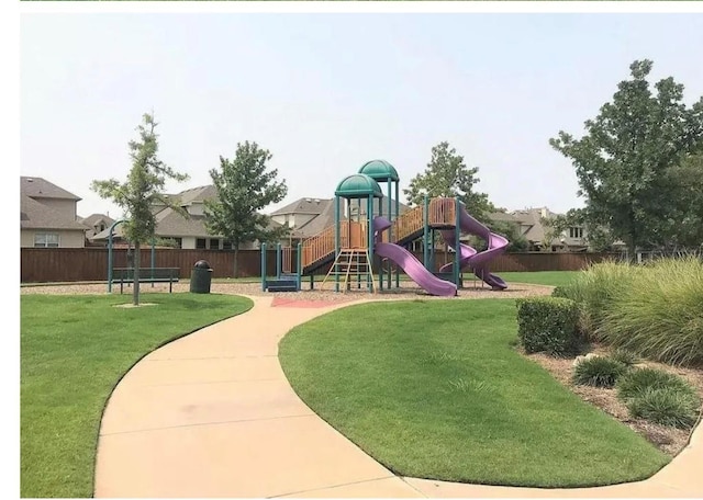 view of playground featuring a yard