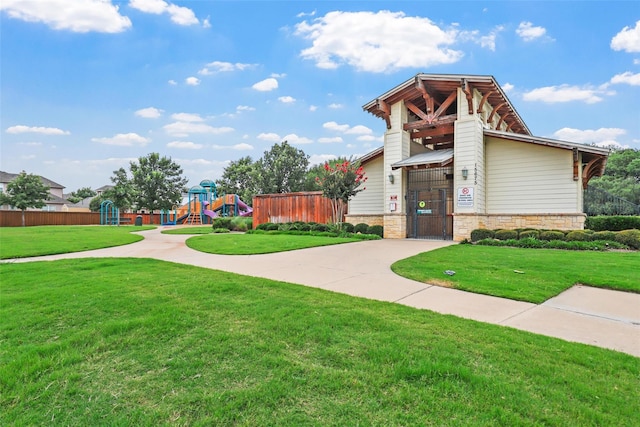 exterior space featuring a playground and a lawn