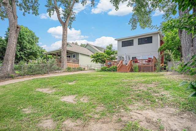 view of yard with a deck