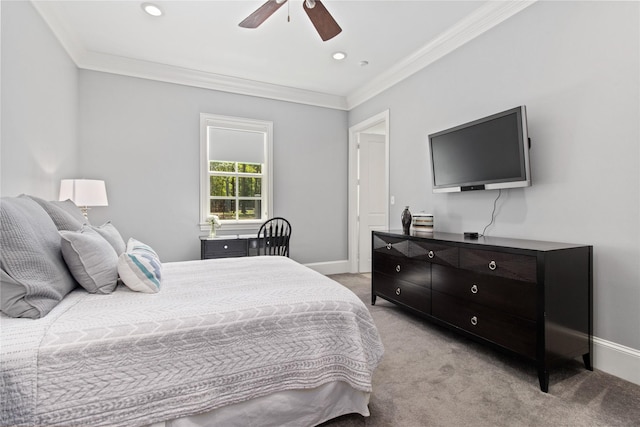 bedroom featuring ceiling fan, crown molding, and light carpet