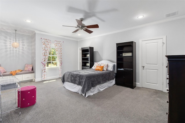 bedroom with carpet, ceiling fan, and crown molding