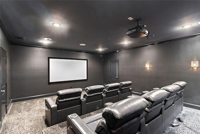 home theater with carpet flooring and ornamental molding