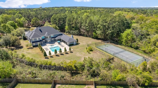 6090 Graemont Blvd, Tyler, TX 75703 - birds eye view of property with a forest view