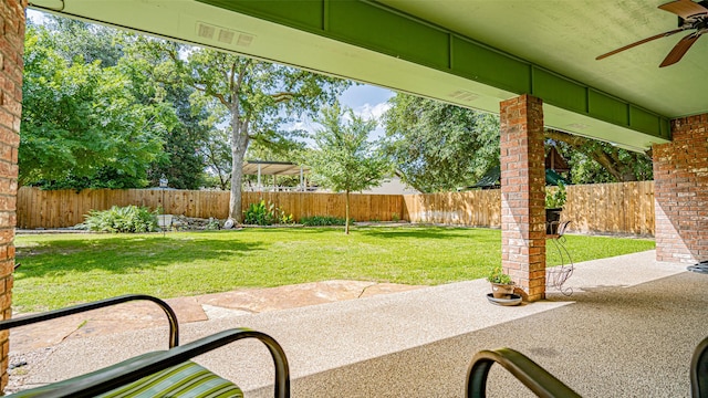 view of patio with ceiling fan