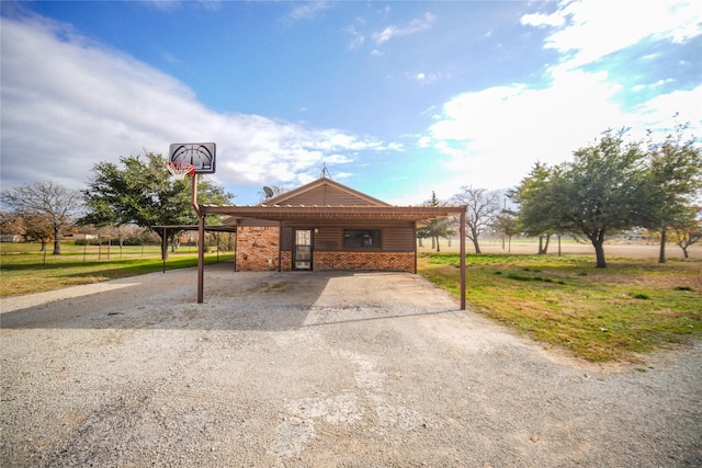 exterior space with a lawn and a rural view