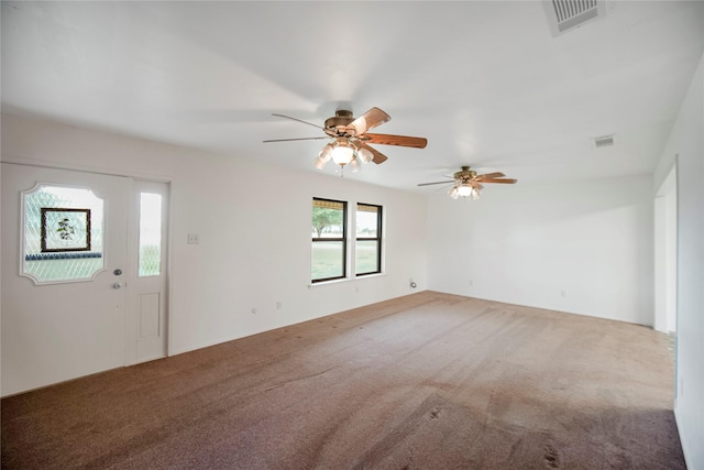 interior space featuring ceiling fan