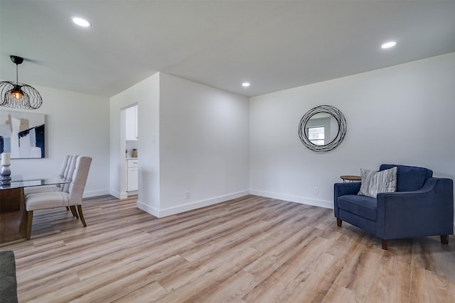 living area featuring light hardwood / wood-style floors