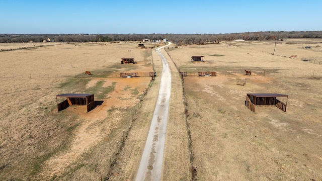 birds eye view of property featuring a rural view