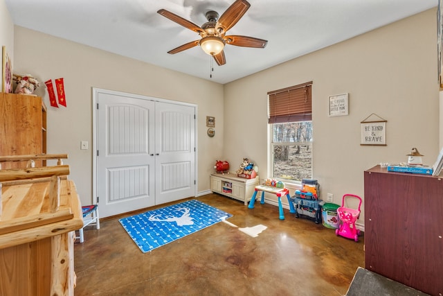 playroom featuring ceiling fan