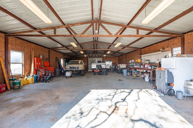 garage with white refrigerator