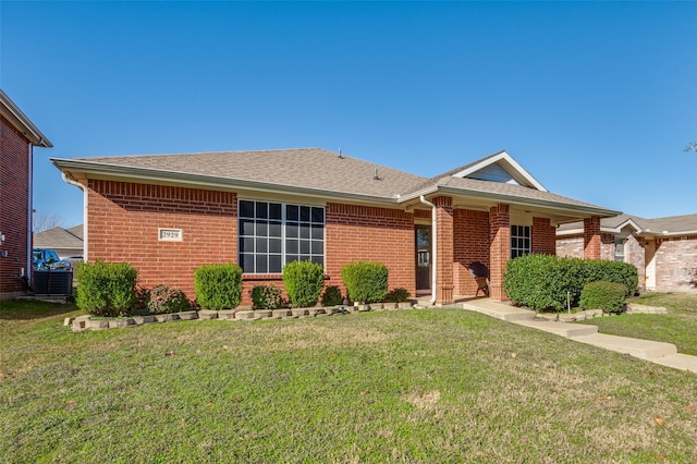 ranch-style house featuring a front yard