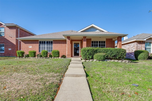 ranch-style house featuring a front lawn