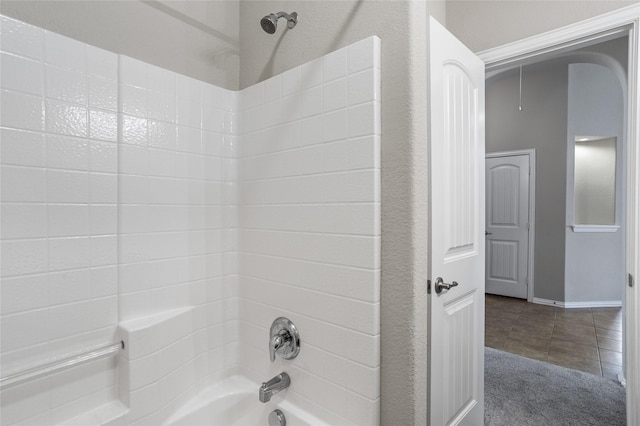 bathroom with  shower combination and tile patterned flooring